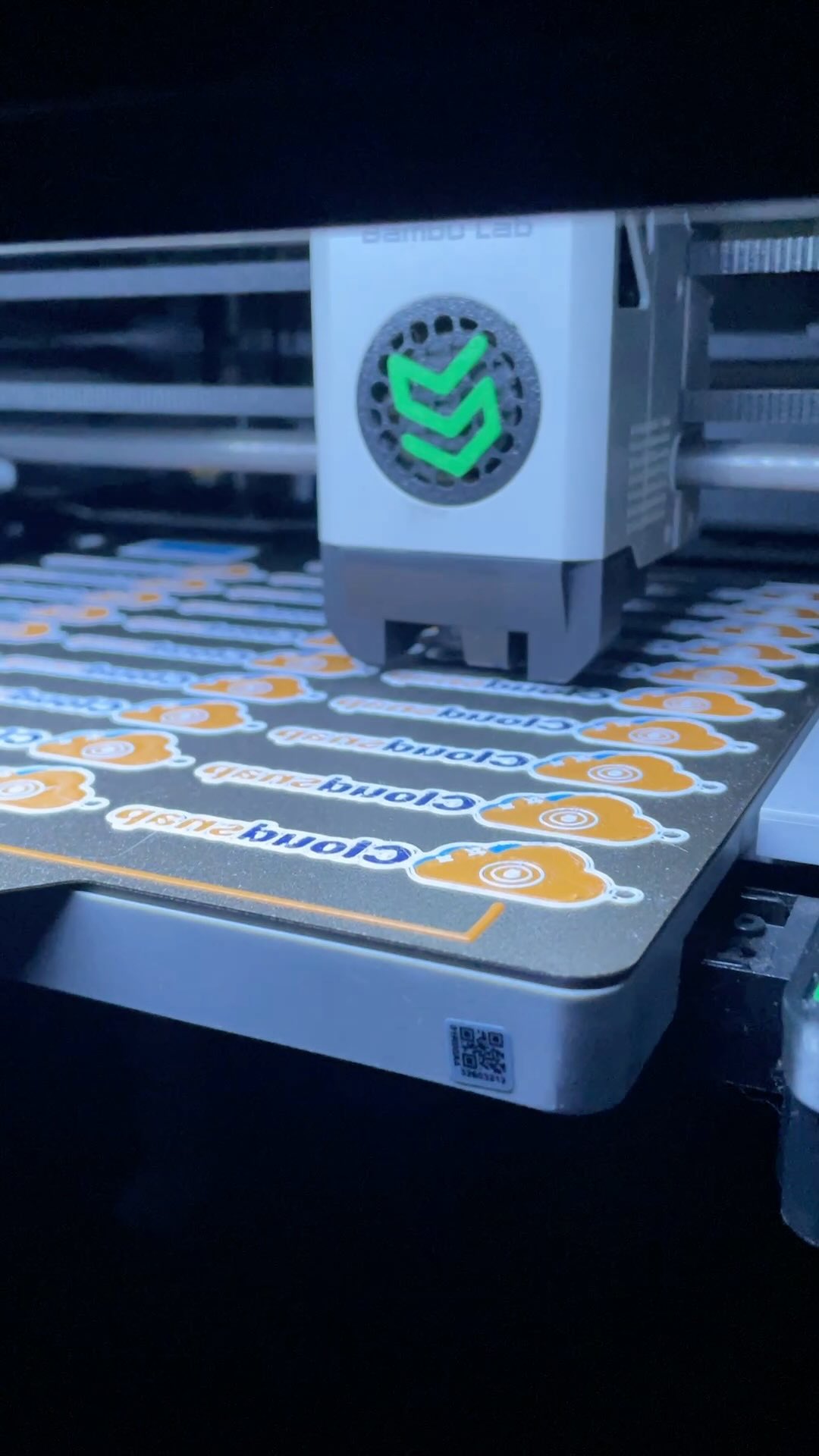 CloudSnap logo keychains and magnets being 3D printed for TIF Helexpo